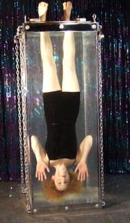 Dayle Krall performing the 21st Century Water Torture Cell!